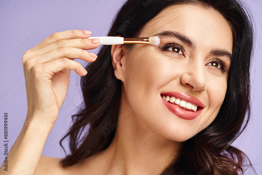 A smiling woman holds a brush, embodying beauty and creativity. A smiling woman holds a brush, embodying beauty and creativity.