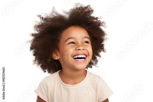 Joyful African American child grinning widely Isolated on white background