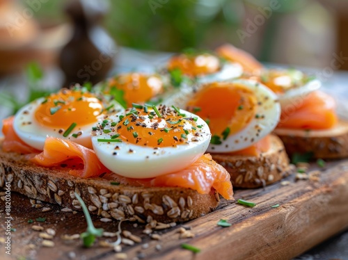 Close Up of Boiled Egg and Smoked Salmon Toast With Thyme and Spices