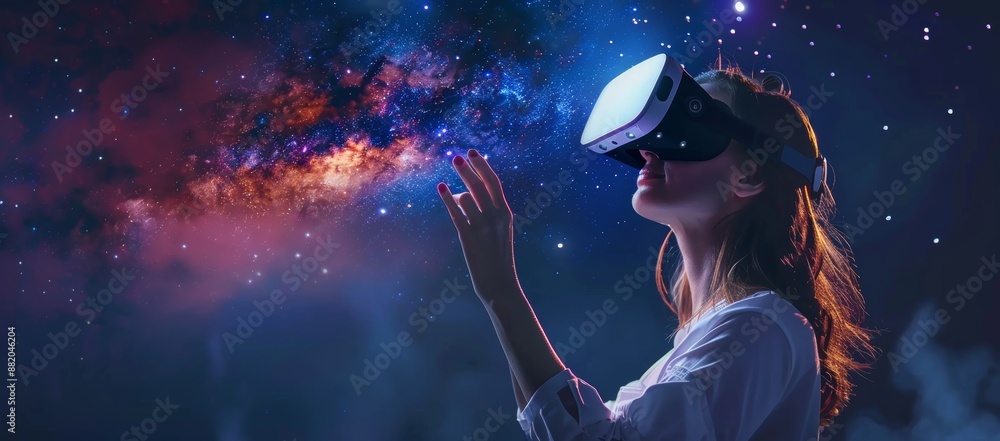 Woman with flowing hair wearing augmented reality glasses. Girl in augmented reality glasses. Mixing reality and game. Virtual reality concept. Woman with flowing hair wearing augmented reality glasses. Girl in augmented reality glasses. Mixing reality and game. Virtual reality concept.