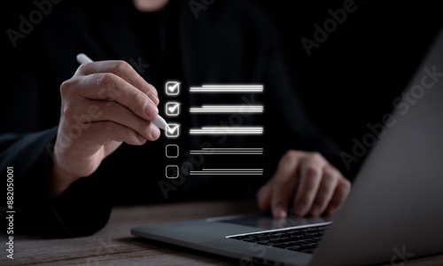 Obraz na płótnie businessman efficiently utilizes a Document Management System (DMS) and task man
