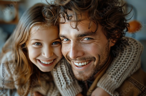 Happy Family Portrait With Smiling Couple and Daughter Indoors