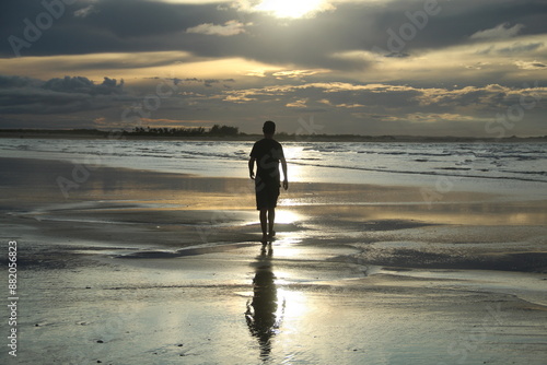 silhueta de homem em barra do mundaú, ceará  photo