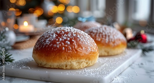 Powdered Sugar Covered Bread Roll on Marble Board During Holiday Season