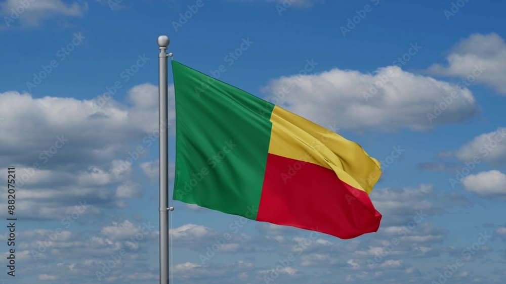 Benin flag waying in the wind against the running clouds on blue sky, close-up flag video Benin flag waying in the wind against the running clouds on blue sky, close-up flag video