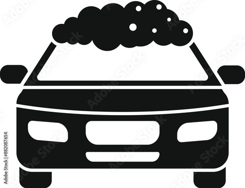 Black silhouette of a car getting washed and covered in soap suds
