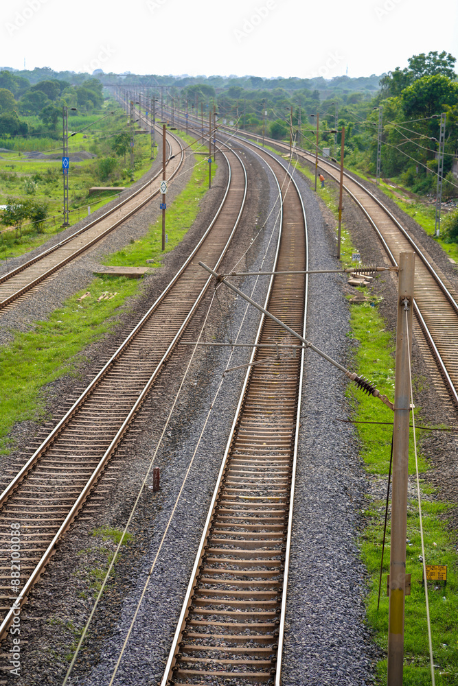 Railway Tracks Through Green Landscape, railroad tracks in the forest, railway track India, top view railway tracks stock images Railway Tracks Through Green Landscape, railroad tracks in the forest, railway track India, top view railway tracks stock images