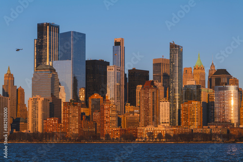 The evolving Downtown Manhattan skyline at sunset, panoramic view from Liberty State Park. High quality photo