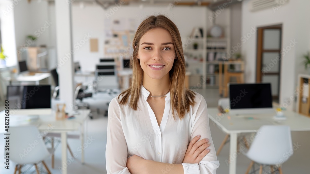 Confident Young Adult Entrepreneur in Modern Workspace with Deep Depth of Field Confident Young Adult Entrepreneur in Modern Workspace with Deep Depth of Field