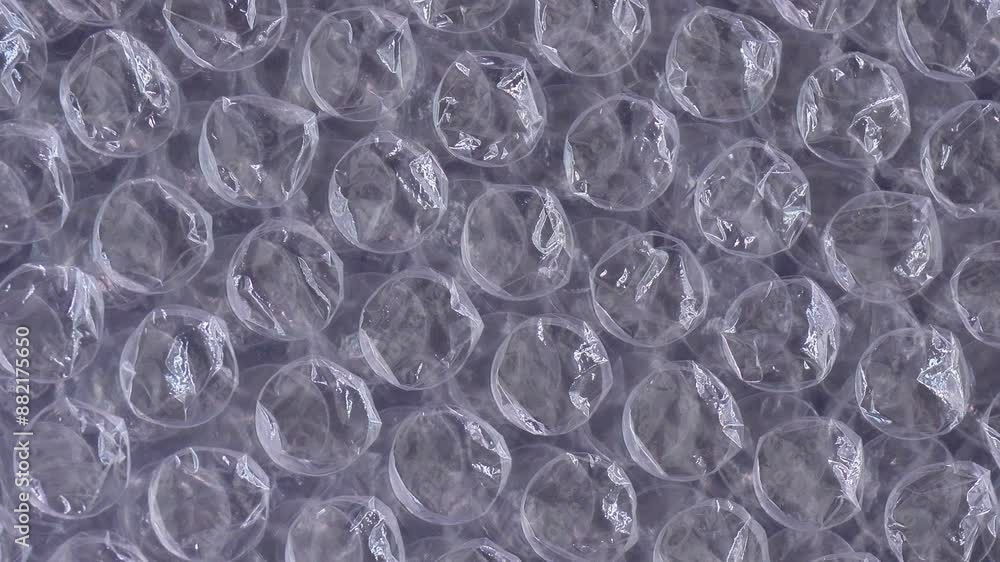 Bubble wrap rotate clockwise. Top view plastic bubbles close-up Bubble wrap rotate clockwise. Top view plastic bubbles close-up