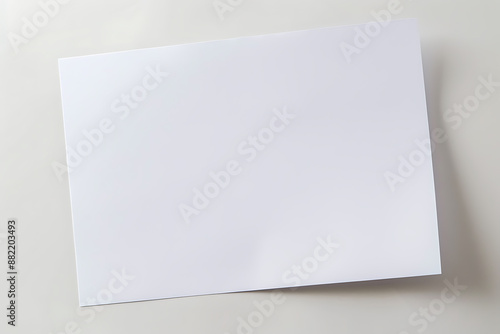 Blank sheet of white paper on an isolated background. Top front view of an empty page for mockup. AI generated. © Canary