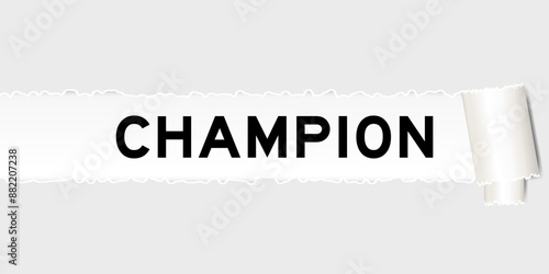 Ripped gray paper background that have word champion under torn part