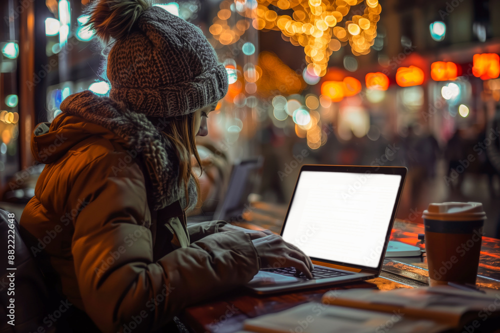 Student studying on a laptop in a cozy cafe at night Student studying on a laptop in a cozy cafe at night