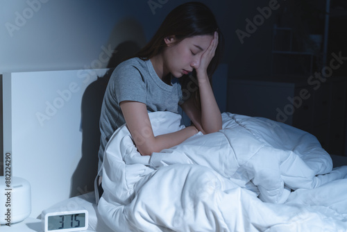 Obraz na plátne Anxiety disorder on insomnia woman concept, sleepless Woman open eye awakening on the bed at night time can't sleep from symptom of depression diseased