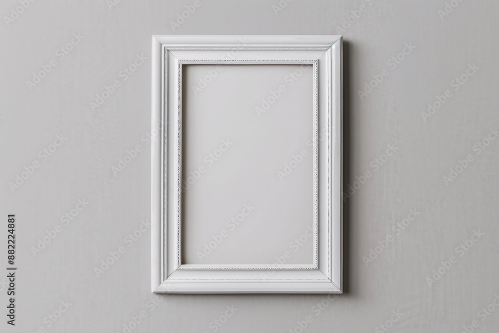 A photo mockup featuring a blank white frame centered on a plain, light gray background. The frame ratio is perfectly balanced, with sharp edges and clean lines, providing an ideal template for A photo mockup featuring a blank white frame centered on a plain, light gray background. The frame ratio is perfectly balanced, with sharp edges and clean lines, providing an ideal template for