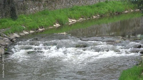water flowing into the river