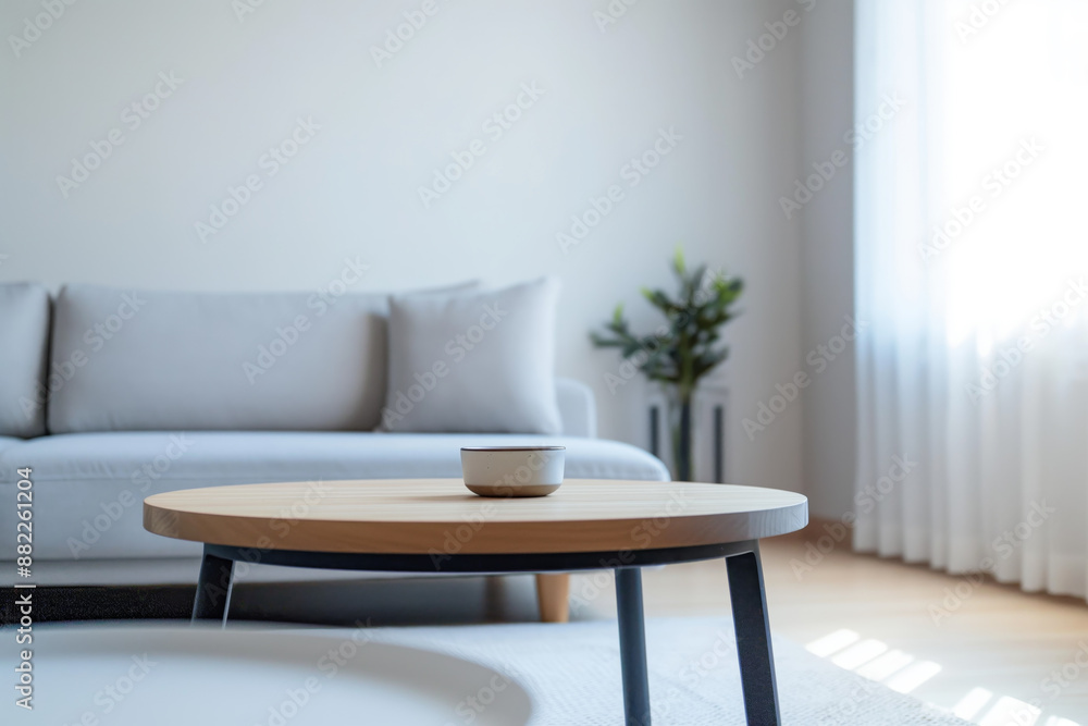 Minimalist Living Room with Modern Coffee Table and Cozy Sofa in Natural Light Minimalist Living Room with Modern Coffee Table and Cozy Sofa in Natural Light