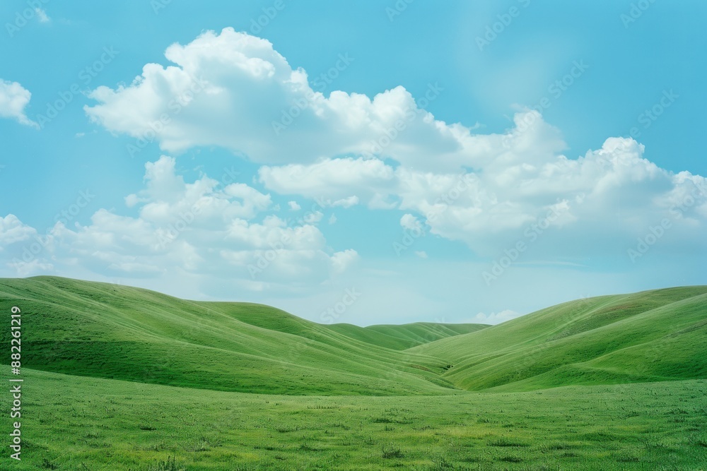 Fototapeta premium Rolling Green Hills Under a Blue Sky