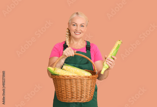 Happy mature female farmer ...