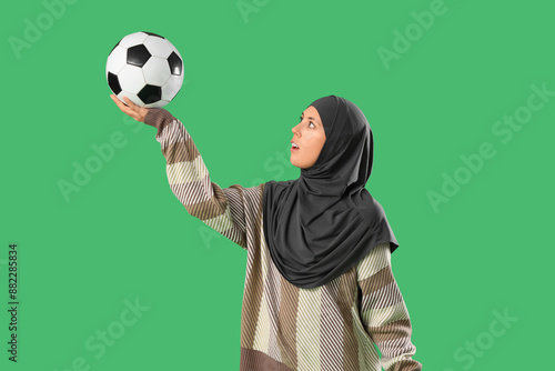 Shocked young Muslim woman ...