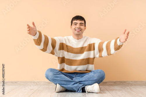 Young man opening arms for ...