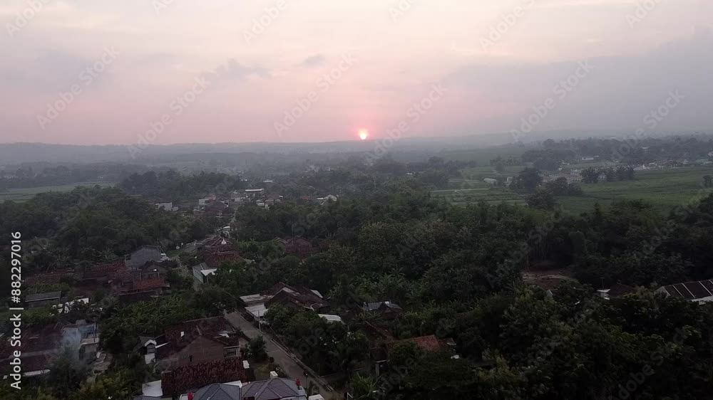 Aerial view of rural village at sunset Aerial view of rural village at sunset