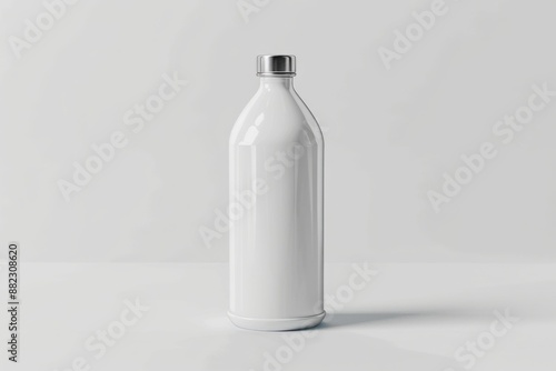 White insulated stainless steel bottle on white © JM Nimhas