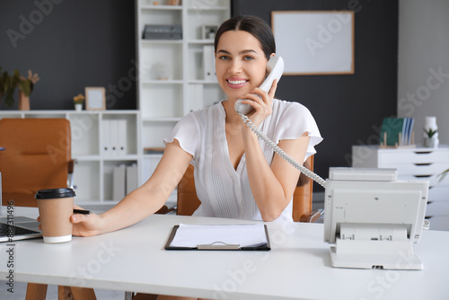 Pretty businesswoman talkin...