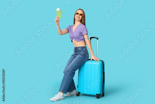 Smiling young woman sitting...
