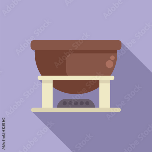 Big boiler for alcohol beverage production standing on gas stove with fire burning