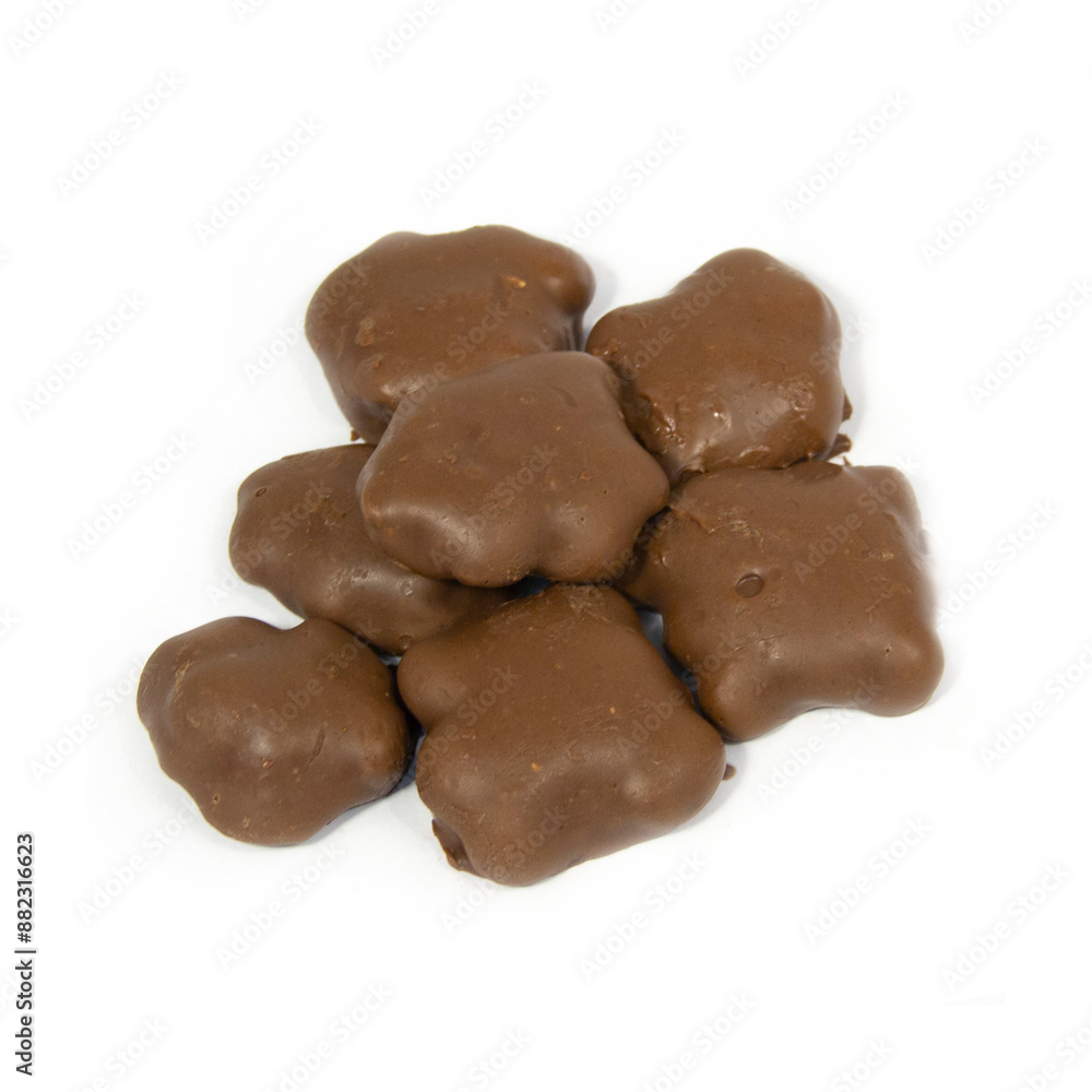 Milk Chocolate Caramel Peanut Patties on White Background Milk Chocolate Caramel Peanut Patties on White Background