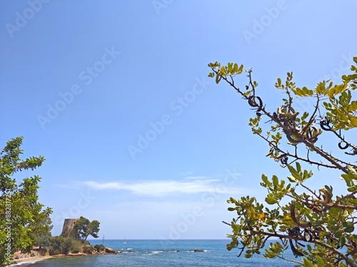 Küste mit Wehrturm in Santa Maria Navarrese auf Sardinien photo