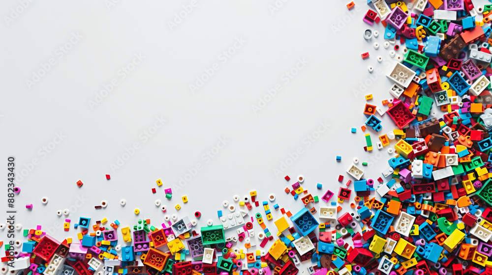 colorful toy building bricks on white background, with copy space colorful toy building bricks on white background, with copy space