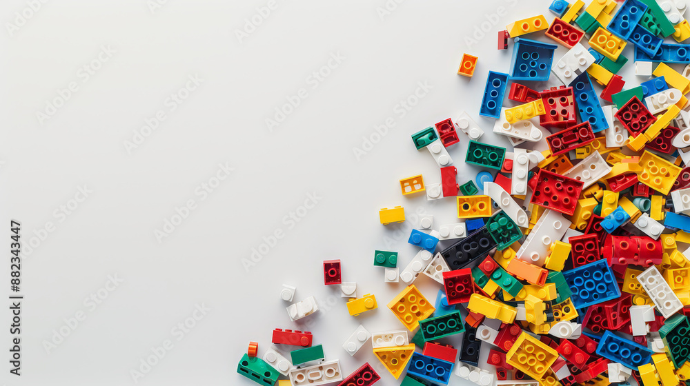 colorful toy building bricks on white background, with copy space colorful toy building bricks on white background, with copy space