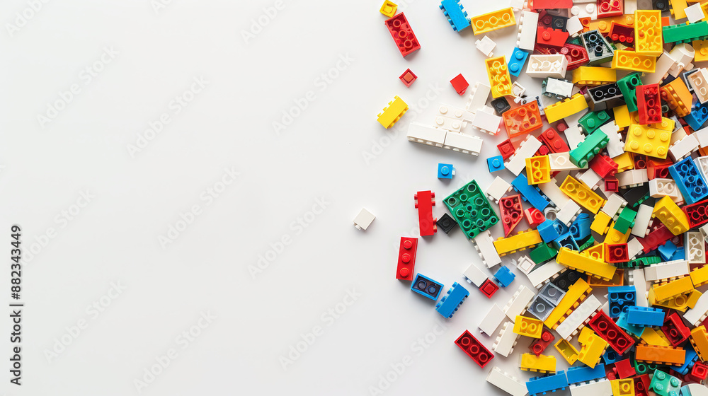 colorful toy building bricks on white background, with copy space colorful toy building bricks on white background, with copy space