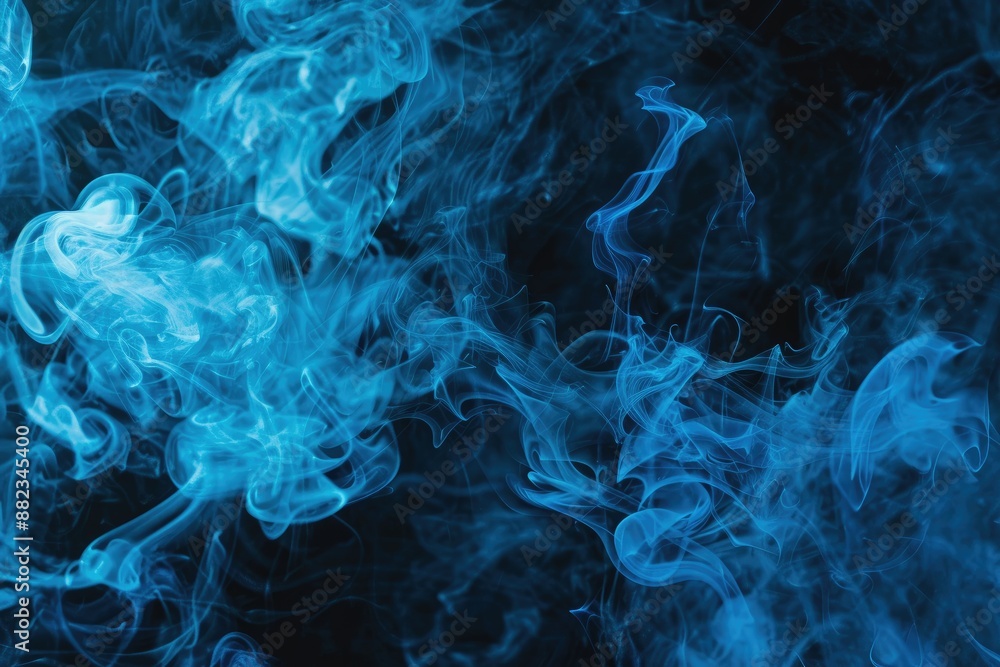 Obraz premium Ethereal Image of Blue Smoke Against a Black Backdrop Creating a Striking and Atmospheric Visual
