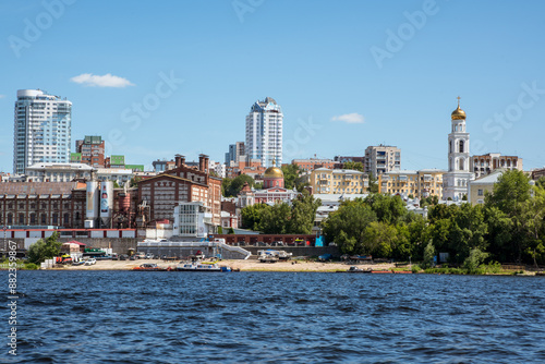 Volga river embankment in Samara, Russia. Panoramic view of the city with modern buildings photo