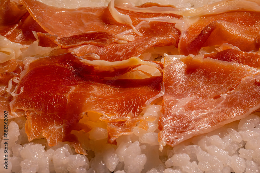 A macro shot capturing the detailed texture of smoked meat. The bright orange color and intricate surface details highlight the quality and freshness of the fish. A macro shot capturing the detailed texture of smoked meat. The bright orange color and intricate surface details highlight the quality and freshness of the fish.