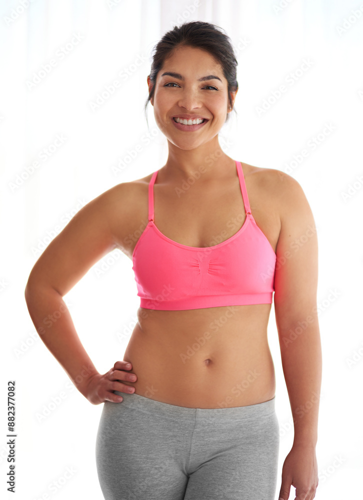 Portrait, confident and happy woman in studio for abs, fitness and activewear on white background. Proud person, sports bra or healthy athlete ready for losing weight, training workout or exercise Portrait, confident and happy woman in studio for abs, fitness and activewear on white background. Proud person, sports bra or healthy athlete ready for losing weight, training workout or exercise
