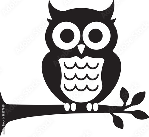 owl sitting on branch