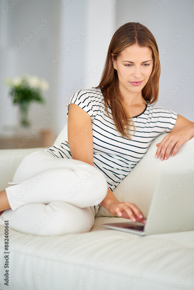 Woman, laptop and internet browsing on couch for streaming movies, watching online video and blog update in home. Lady, sofa and computer for social media post, reading ebook and series subscription Woman, laptop and internet browsing on couch for streaming movies, watching online video and blog update in home. Lady, sofa and computer for social media post, reading ebook and series subscription