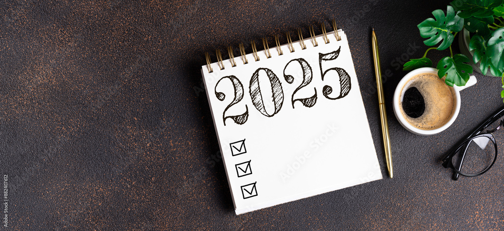 © missmimimina - New year resolutions 2025 on desk. 2025 resolutions list with notebook, coffee cup on table. Goals, resolutions, plan, action, checklist concept. New Year 2025 template, copy space © missmimimina - New year resolutions 2025 on desk. 2025 resolutions list with notebook, coffee cup on table. Goals, resolutions, plan, action, checklist concept. New Year 2025 template, copy space