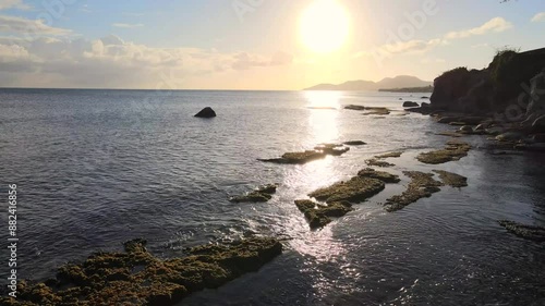 Drone shot over a beach at Vieques, Puerto Rico, USA at sunset 