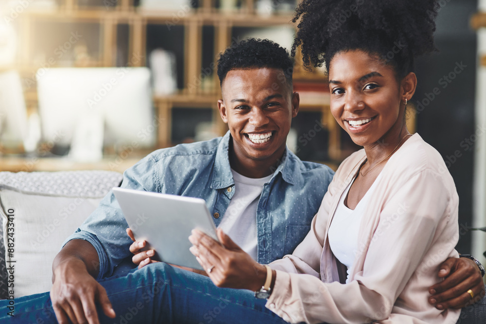 Black couple, portrait and happy with tablet in home for digital app, reading email or social media scroll on sofa. People, smile and technology in living room for online browsing and watching movie Black couple, portrait and happy with tablet in home for digital app, reading email or social media scroll on sofa. People, smile and technology in living room for online browsing and watching movie