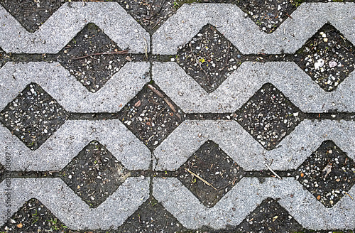 Seamless texture, garden stone block pavement with soil inside photo