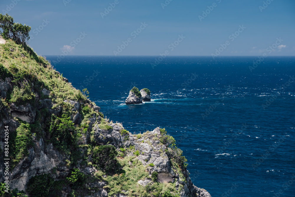 Impressive scenery of the ocean and the steep cliffs Impressive scenery of the ocean and the steep cliffs