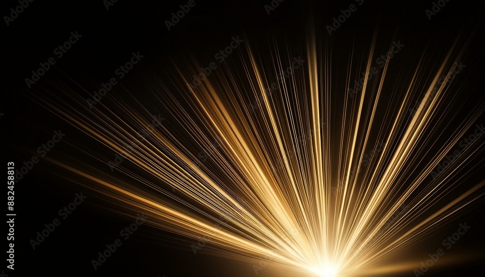 Shades of gold flare of light on plain black background Shades of gold flare of light on plain black background