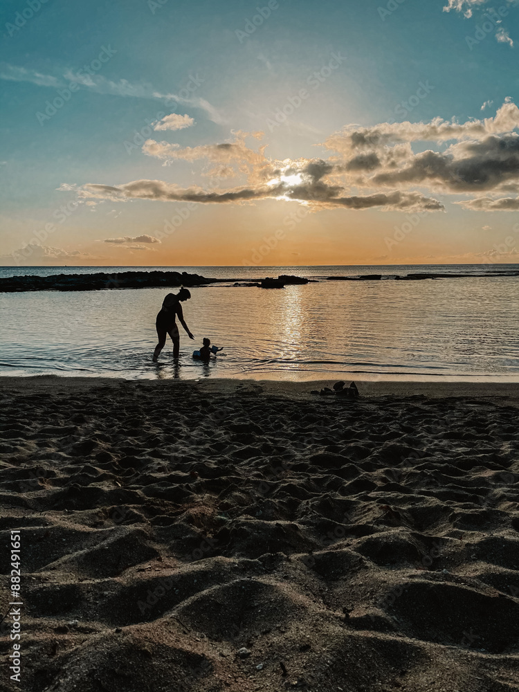 Naklejka premium sunset on the beach