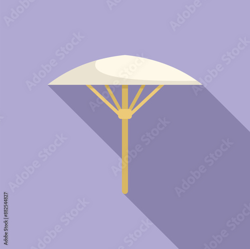 White beach umbrella casting a cool shadow on a sunny day, offering respite from the heat