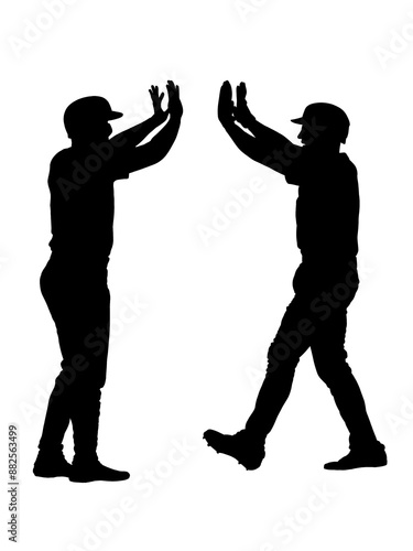 ハイタッチする野球選手のシルエット